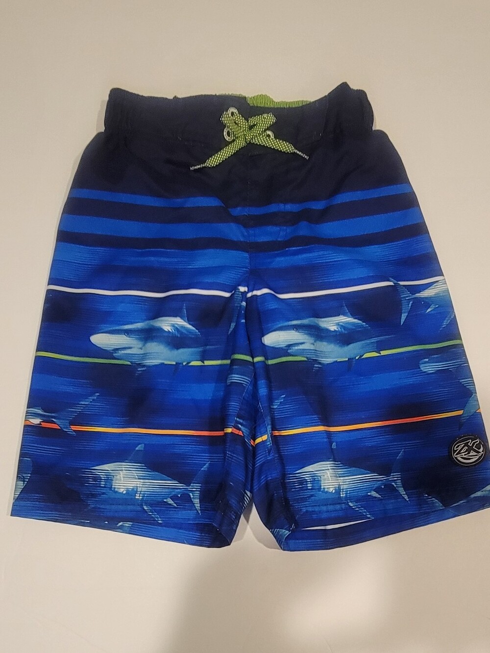 Boys Size 8 Like New ZeroXposur Black and Neon Green With Shark Swim Trunks.